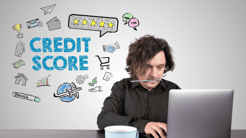 a man biting pen while checking his credit score